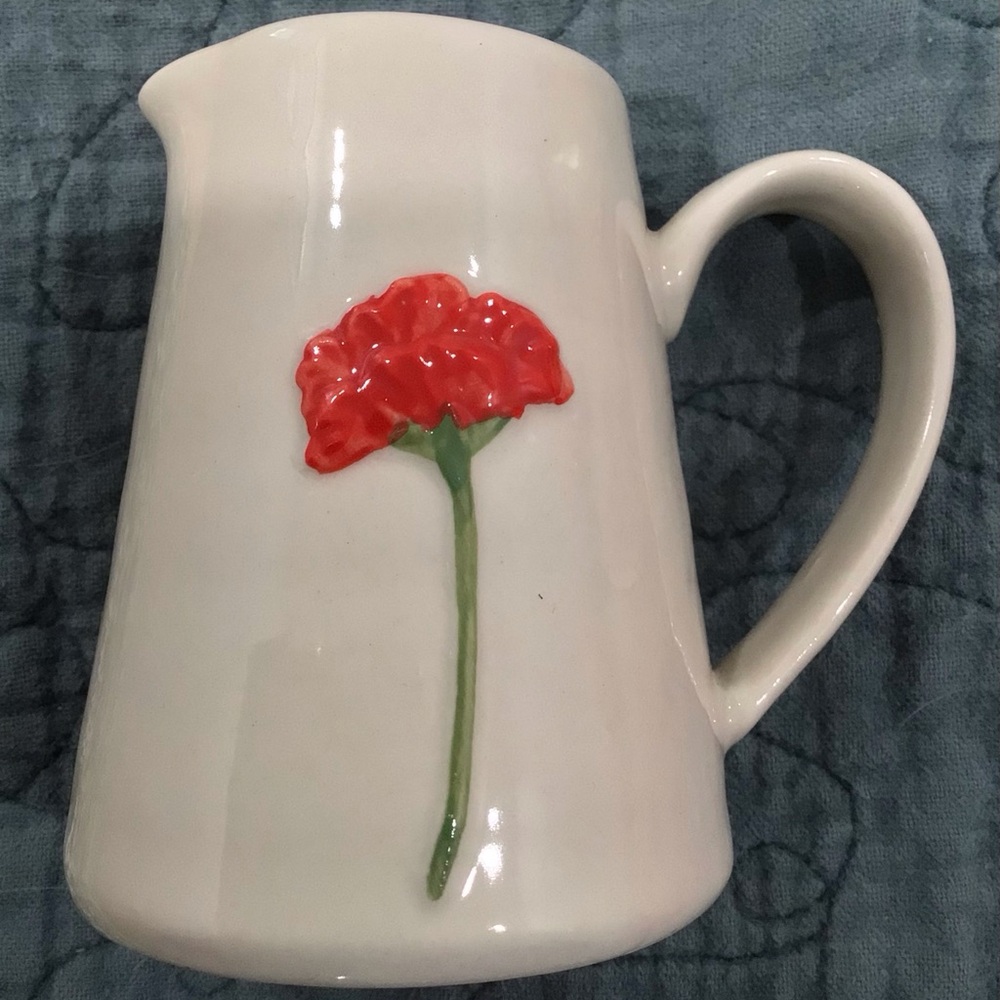 MINI CERAMIC PITCHER WITH RAISED FLORAL ACCENT